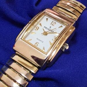 Peugeot Gold Tone Women's Petite Watch
New battery fully working